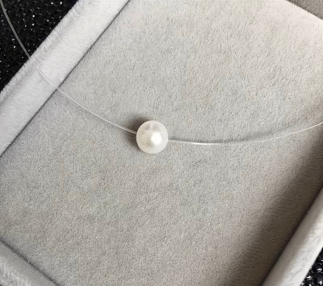 Single Pearl-Look Floating Necklace with Clear Cord