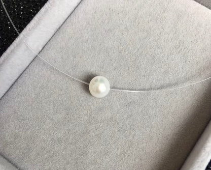 Single Pearl-Look Floating Necklace with Clear Cord