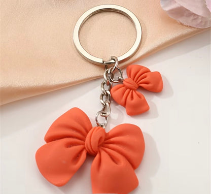 FUN ORANGE BOW KEYCHAIN