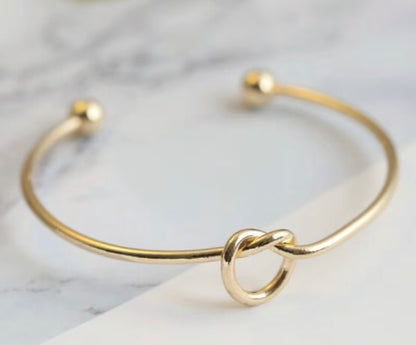 GOLD LOVE KNOT OPEN BRACELET