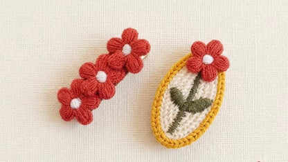 RED FLOWER BARRETTES