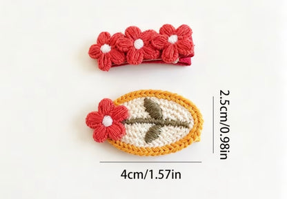 RED FLOWER BARRETTES
