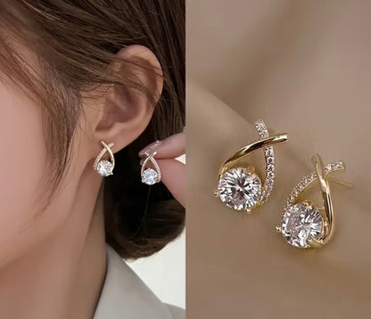 Gold-Tone Twisted Teardrop Earrings with Clear Stones
