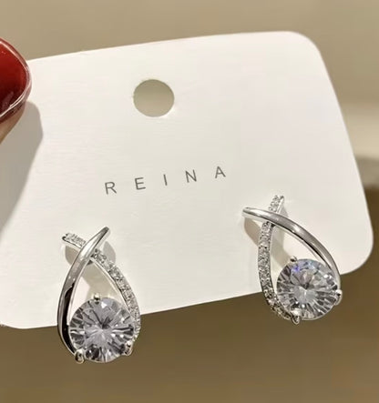 Silver-Tone Twisted Teardrop Earrings with Clear Stones
