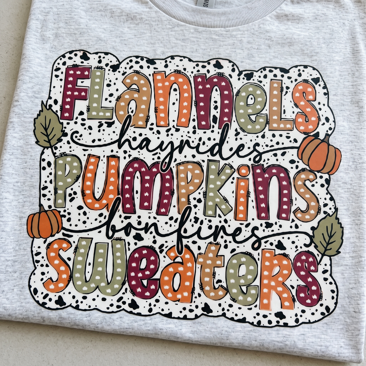 "FLANNELS, PUMPKIN, SWEATERS" T-SHIRT